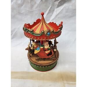 Hallmark Card Inc Musical Carousel with Santa and reindeer. Vintage and works